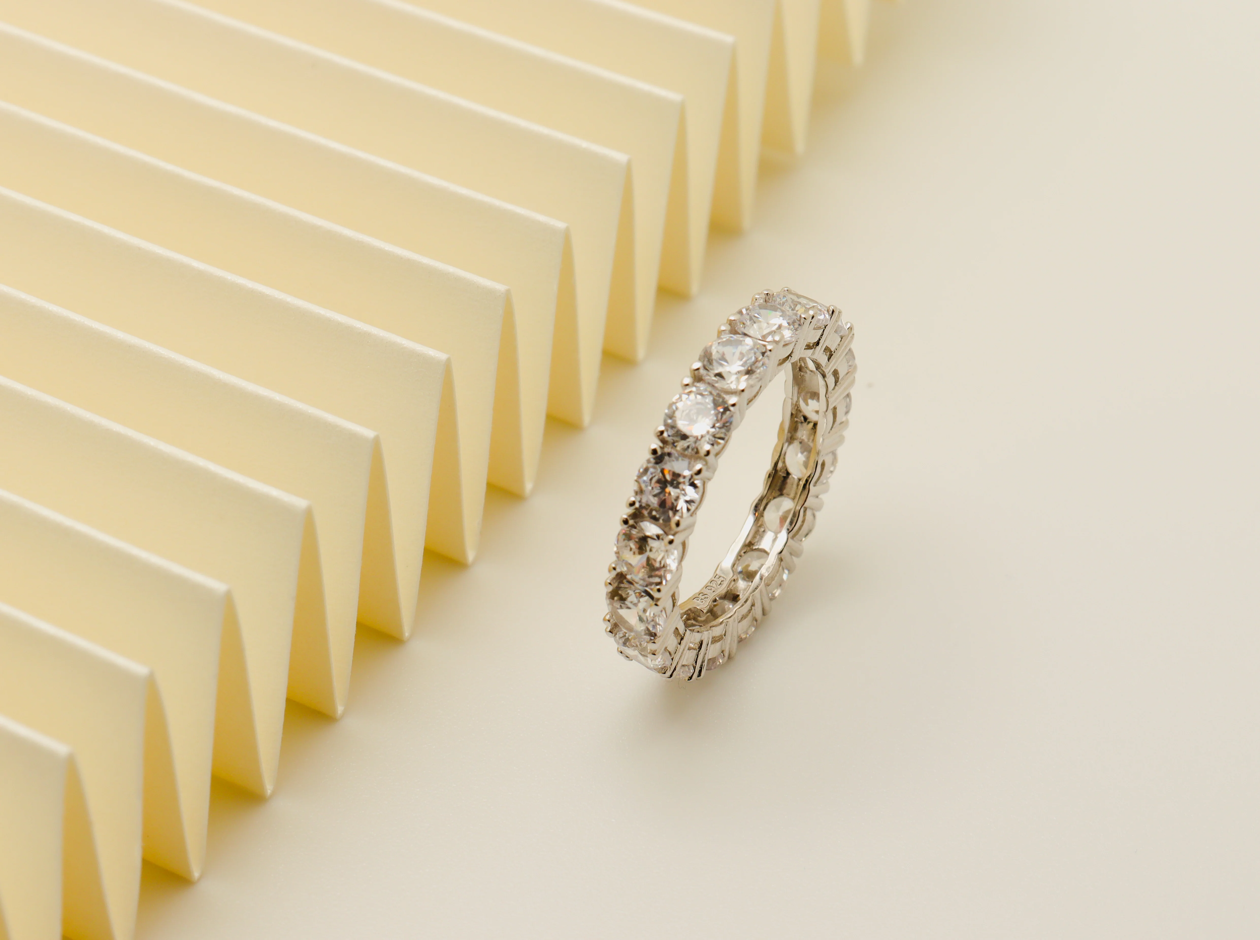 White Round Cut Silver Eternity Ring - Image 6